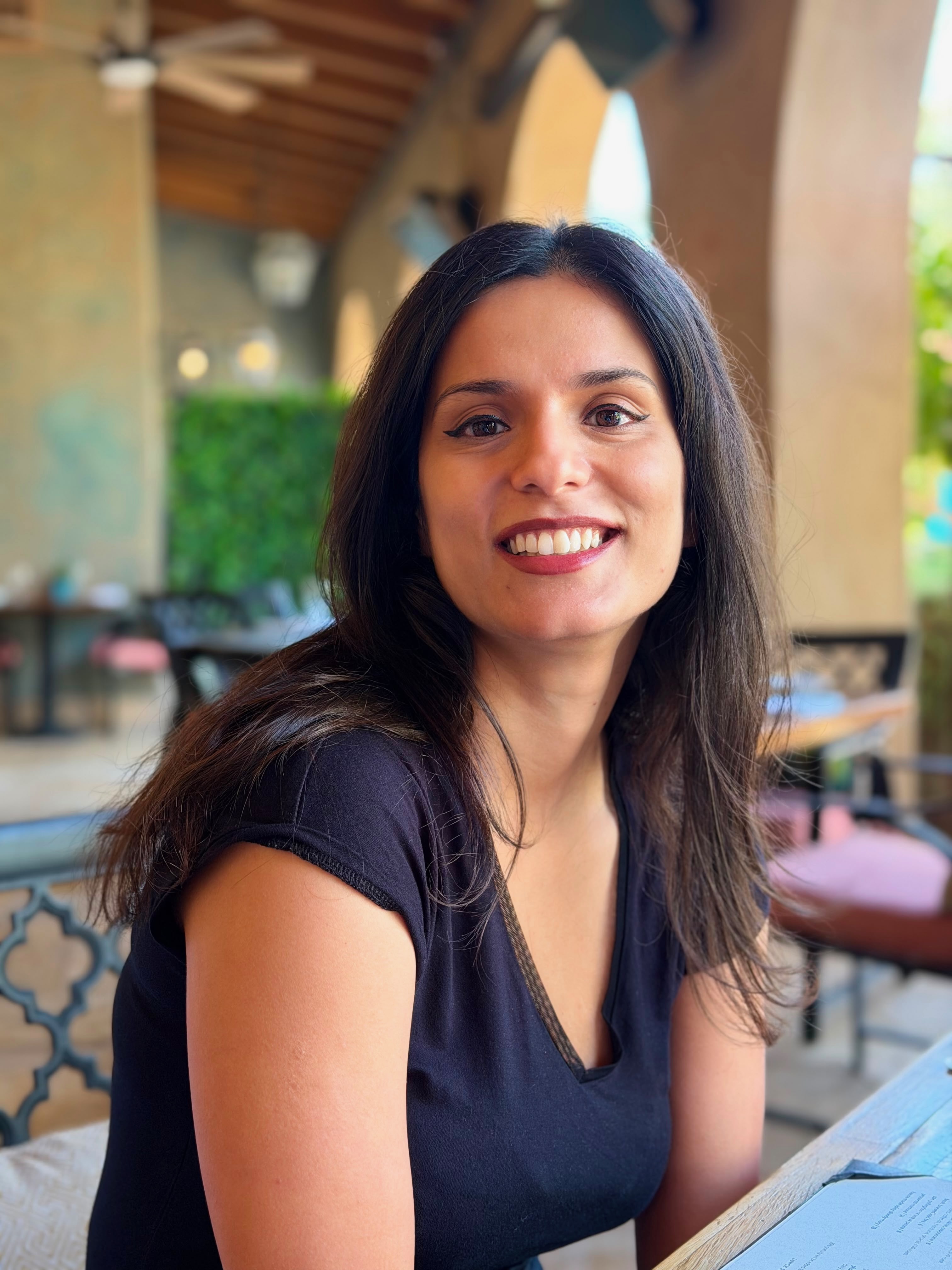 Portrait of Eeshita at a table